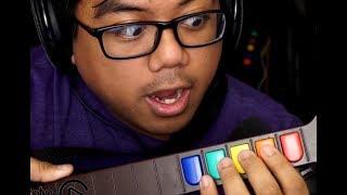 acai teaches new guitar hero players how to orange button