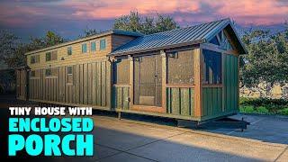 Front and back porches are enclosed in this Park Model tiny house