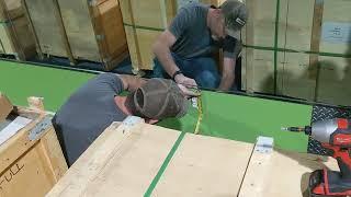 Fitness Center Installing Aluminum Diamond Plate Wall Panels Below the Gym Mirrors