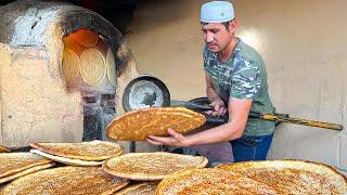 Extremely large shaped flatbread. Style of FERGANA valley