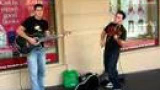 The violin guy plays Crowded House on Queen St , Auckland N.Z