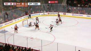 Noah Cates scores a goal against the New Jersey Devils