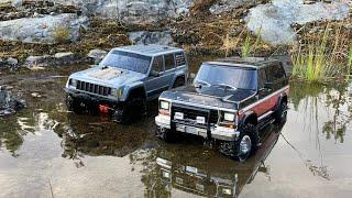 Axial SCX10 II Jeep Cherokee and Traxxas TRX4 Ford Bronco in wet rock crawling