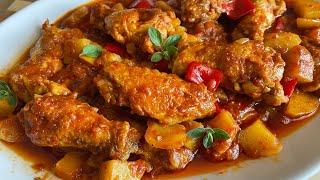 CHICKEN WINGS IN TOMATO STEW WITH POTATOES AND PEPPERS