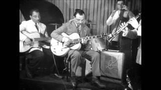 Django Reinhardt playing an Epiphone, May 30, 1946.