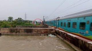 Heavy Trains Traffic Over Flooded Canal Trains Pass At High Speed