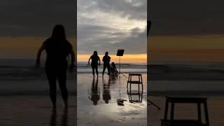 Golden hour maternity photoshoot in the sea using Godox off camera flash and Canon R5