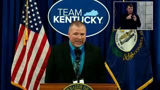 Scott Johnson accepts award from Kentucky Department of Education