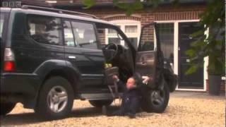 Dwarf falls out of a car