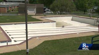 Businesswoman, volunteers get community pool ready for summer