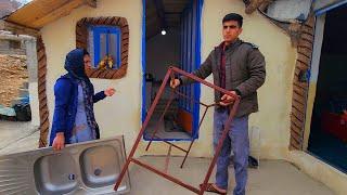 "Strengthening the roof of the chicken house of Abou Farm by laying wood and boards"