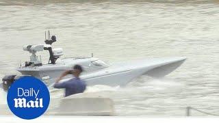 Unmanned Royal Navy 'MAST' drone boat speeds down Thames - Daily Mail