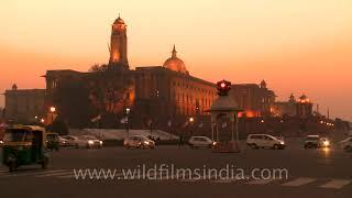 Women carry firewood home, in hustle and bustle of Lutyens Delhi