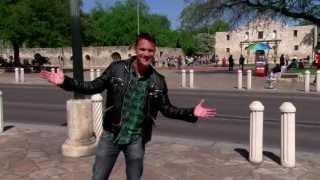 Tom Lowe, as Gus The V8 Superfan, recruits fans at The Alamo