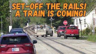 A High-Rail needs to set-off the rails to let several trains go through on the street run!