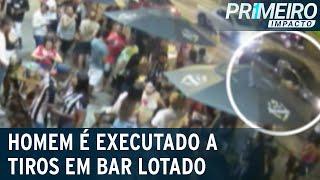 Homem é executado a tiros no meio de bar lotado em Contagem (MG) | Primeiro Impacto (12/04/22)