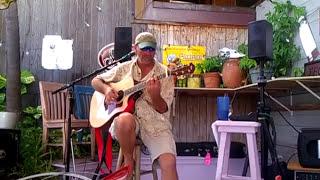 Scotty Bryan  Best weeks of our lives, at a canal front bar in Hawaii Kai.