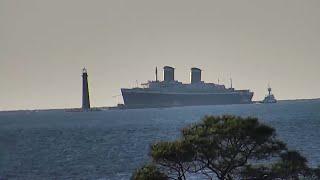 SS United States passing the Sand Island Lighthouse