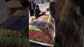 Famous Chinese street food - Yummy Uyghur cut cake / qiegao in Xinjiang 新疆切糕 / 瑪仁糖 / 麻仁 #Shorts