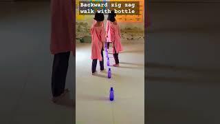 Backward zigzag walk with Bottle (Activity) #hopa little jump a little rhyme #primaryclass