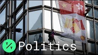 ‘French Spider-Man’ Climbs Hong Kong Skyscraper, Hangs Peace Flag