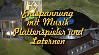 Musik zur Entspannung mit Bildern eines drehenden Plattenspielers und Laternen  von Uwe Georgi