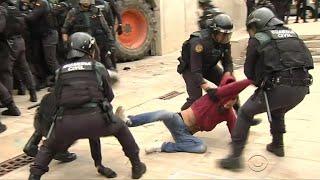 Crackdown on Catalans in Spain as they vote for independence