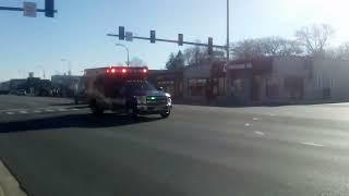 Oak Lawn Fire Department Ambulance #4 is responding code 3.