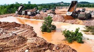 Great Team Work Machinery !! Many Dump Trucks Filling Land With An Old Bullodzers