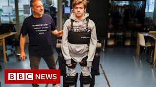 Dad builds robotic exoskeleton to help son walk - BBC News