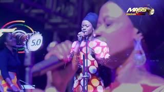 Sola Allyson leads worshippers in the rain at MASS 5.0 Concert Tour of Ibadan