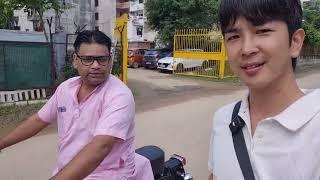 Korean boy is trying to have Indian street foods.