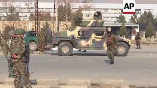 Official: gunmen battle security forces in western Kabul