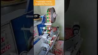 Automatic candy wrapping machine