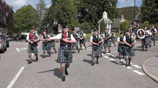 4/4 Marches by Ballater Pipe Band as they parade through Braemar in rural Aberdeenshire, Scotland