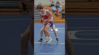 Vince Arvetis takes Logan Connors back to the mat