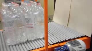 Полуавтоматическая упаковка ПЭТ бутылки в пленку