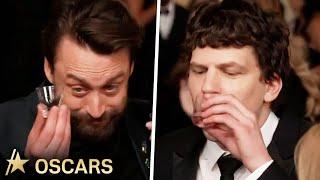 Kieran Culkin & Jesse Eisenberg Do SHOTS w/ Mario Lopez At 2025 Oscars Red Carpet