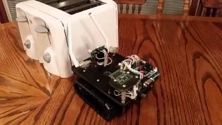 lil DrumBot, a crawling little robot that wants to play drums