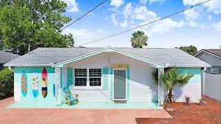 Coastal Dream Home + HUGE Lanai & Canal Views | 13917 Muriel Ave