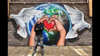 Paul Curtis unveils Eurovision Peace and Love mural at University of Liverpool | The Guide Liverpool