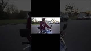 Dog chases motorcycle rider 