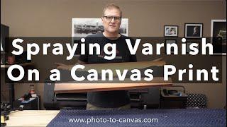 Spraying Varnish on a Canvas Print