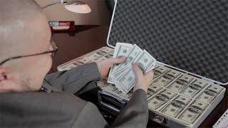 Boss Suitcase Money / Professional stock video footage