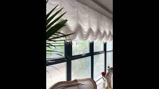 Breathe new life into your windows with the dynamic and elegant motorized roman blinds