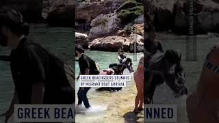 Greek beachgoers stunned by migrant boat arrival