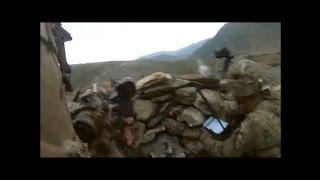 A US sniper team operating out of COP Honaker-Miracle engage Taliban positions in the mountains