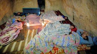 A winter day in afghanistan Village , How this big family survive in a cave