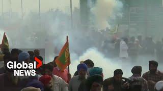 India farmer protests: Police use tear gas, detain protesters marching to New Delhi