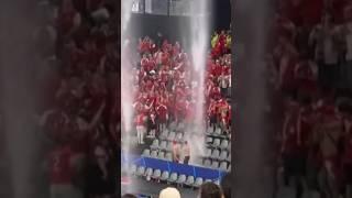 Fans dancing through the crazy thunderstorm at EUROS match Germany vs Denmark